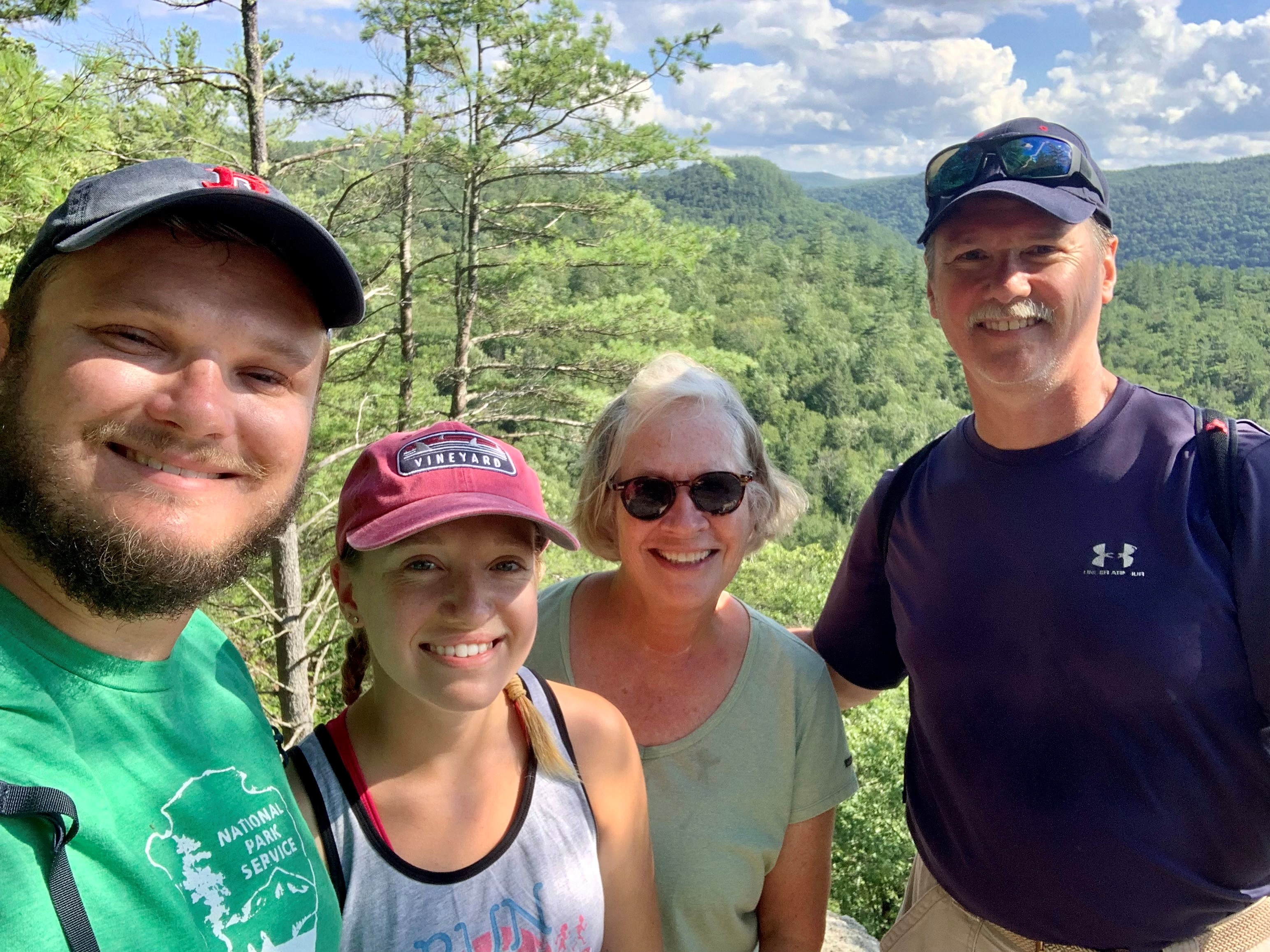 Cathi Cox with family on a hike