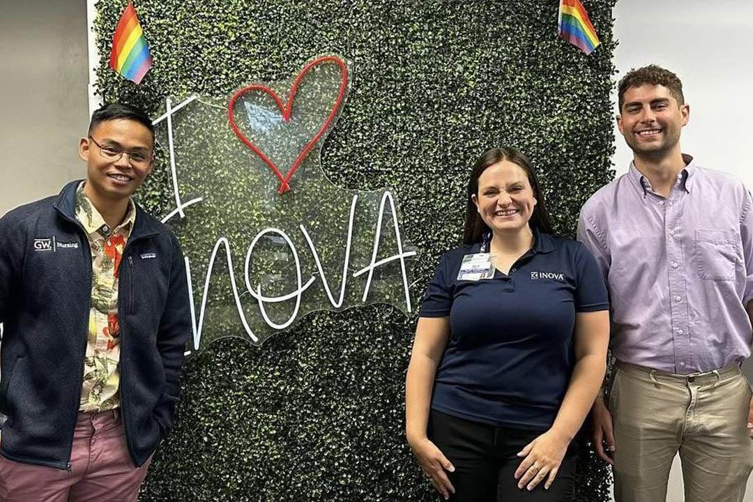 Jeffrey Kai, Skye Bennett and Shawn Bayrd posing in front of an 'I love Inova' sign
