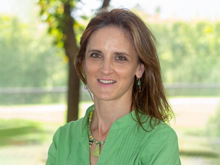 Hildegart Gonzalez standing outside